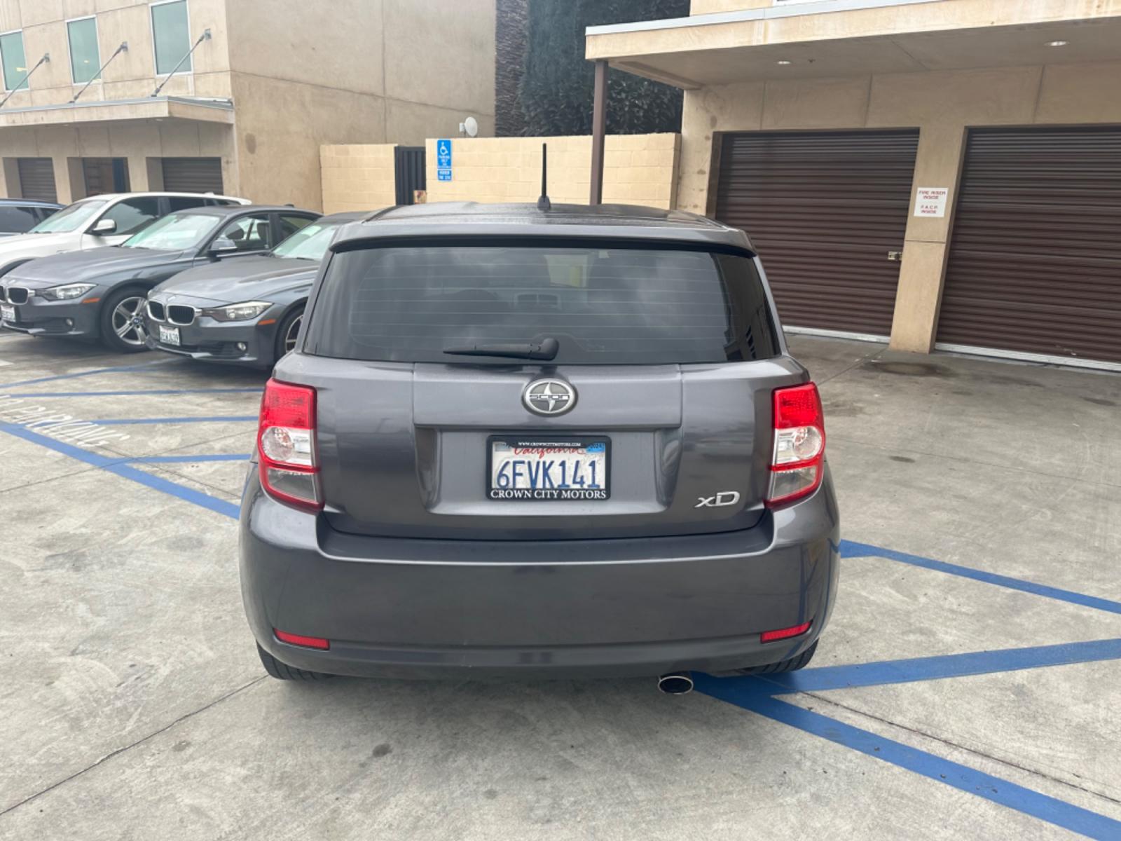 2009 Gray /Black Scion xD 5-Door (JTKKU104X9J) with an 1.8L L4 DOHC16V engine, automatic transmission, located at 30 S. Berkeley Avenue, Pasadena, CA, 91107, (626) 248-7567, 34.145447, -118.109398 - The 2009 Scion XD 4-Door Hatchback is a compact, versatile, and stylish vehicle that offers an exceptional driving experience. Located in the heart of Pasadena, CA, our dealership specializes in a comprehensive selection of used BHPH (Buy Here Pay Here) cars, including the dynamic Scion XD. This veh - Photo #7